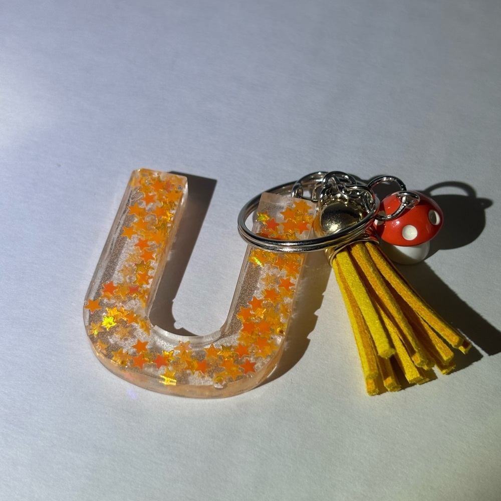 Orange Star Keychain with Yellow Tassel